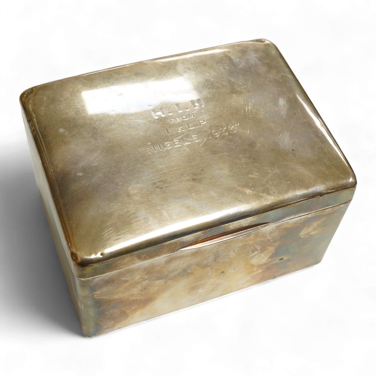 A 1930's silver mounted cigarette box, hallmarks rubbed, length 15.6cm, height 9cm.